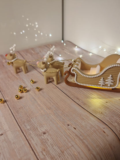 Weihnachtsschlitten mit 3 Rentieren – Rudolf mit roter Nase