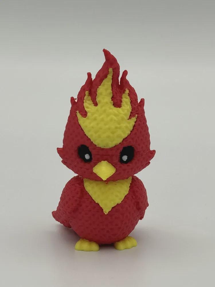 Niedlicher Phönix in Strickoptik  mythische Miniaturfigur