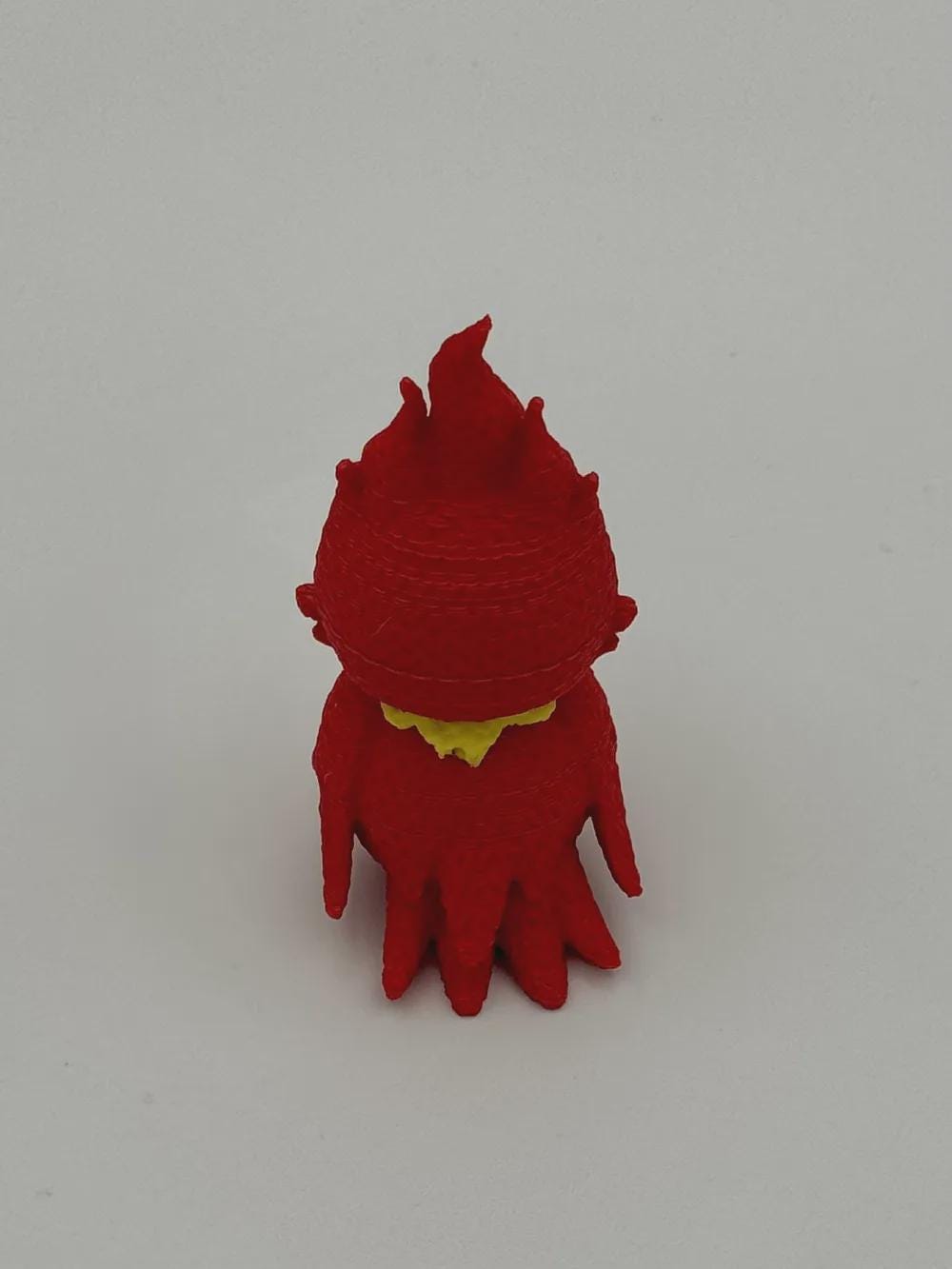 Niedlicher Phönix in Strickoptik  mythische Miniaturfigur