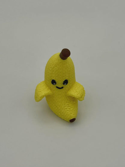 Lächelnde Banane in Strickoptik  lustige Miniaturfigur als Deko oder Geschenk
