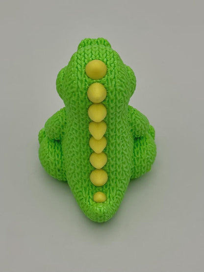 Kleiner Dino in Strickoptik  süße Miniaturfigur als Deko, Geschenk oder für Dino-Fans