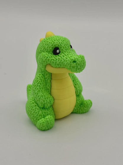 Kleiner Dino in Strickoptik  süße Miniaturfigur als Deko, Geschenk oder für Dino-Fans