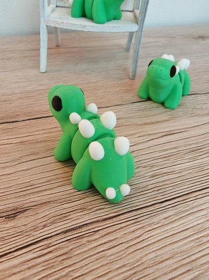 Snuggliez "Baby Stegosaurus"  Flexi-Figur | Beweglicher Mini-Dino | Fidget-Spielzeug & Geschenkidee | CozyLabs Design