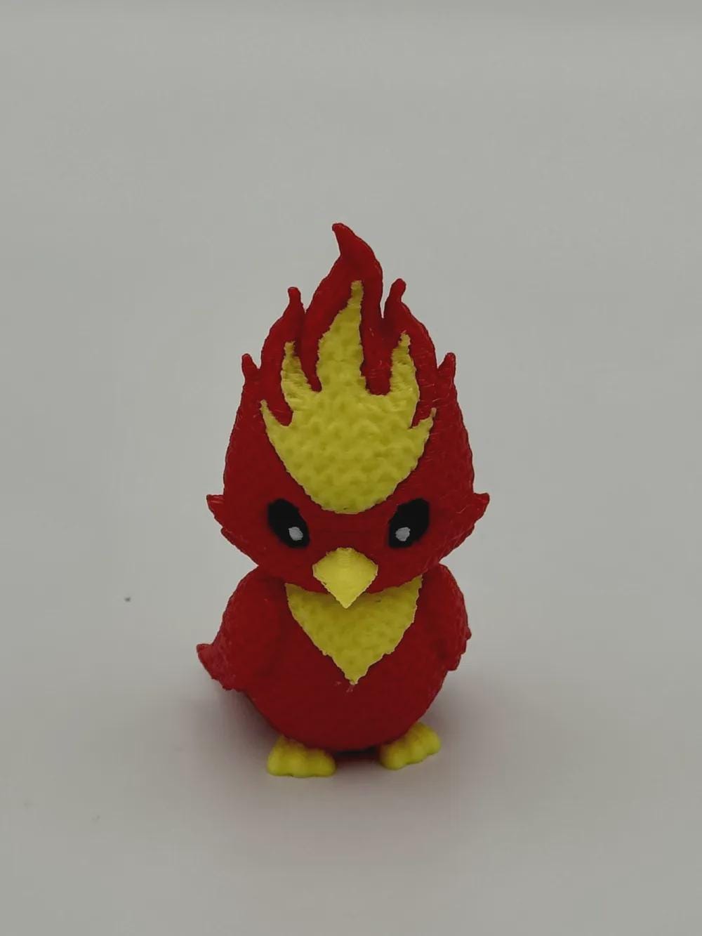 Niedlicher Phönix in Strickoptik  mythische Miniaturfigur