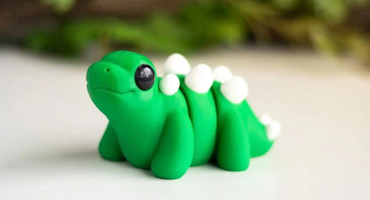 Snuggliez "Baby Stegosaurus"  Flexi-Figur | Beweglicher Mini-Dino | Fidget-Spielzeug & Geschenkidee | CozyLabs Design