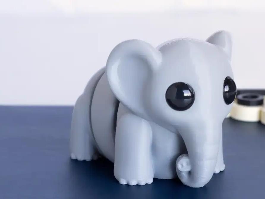 Snuggliez "Baby Elefant"  Bewegliche Flexi-Figur | Mini-Elefant zum Sammeln, Spielen & Verschenken | CozyLabs Design